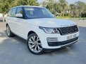 White Land Rover Range Rover Vogue SE 2018 for rent in Dubai 1
